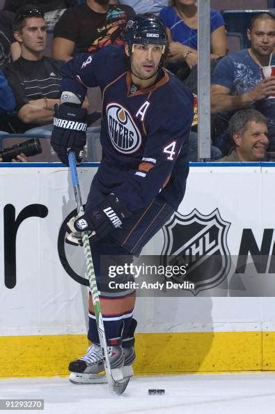 Sheldon Souray of the Edmonton Oilers carries the puck along the ...