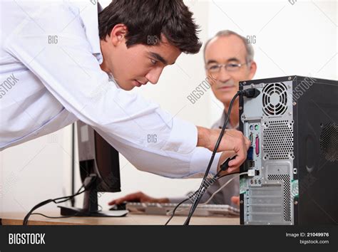 Man Fixing Computer Image And Photo Bigstock