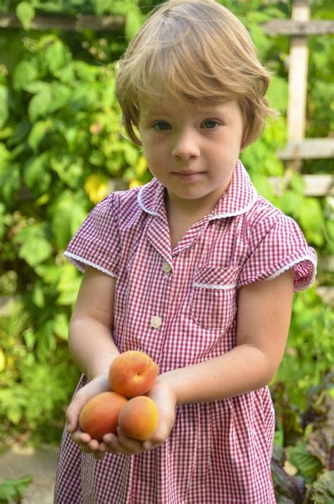Cute Blonde Girl In The Garden Stock Photo Image Of Girl Blonde