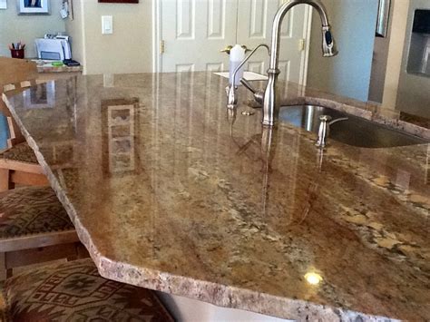 Stone Solutions Granite: Crema Bordeaux Granite with Tile Backsplash