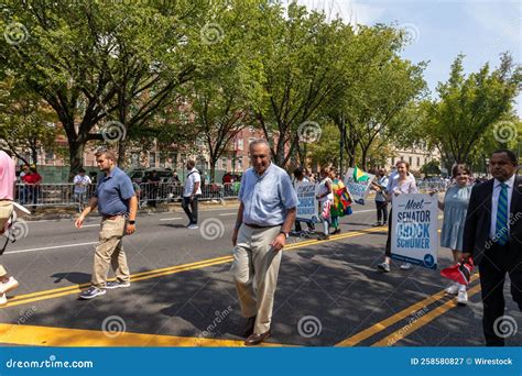 People Walking with Chuck Schumer at the West Indian Labor Day Parade ...