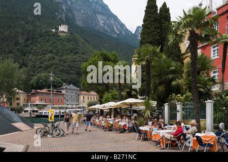 Lakefront restaurant, Riva del Garda, Lake Garda, Italy Stock Photo - Alamy