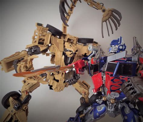 Bonecrusher Vs Optimus By The Dapper Scrapper On Deviantart