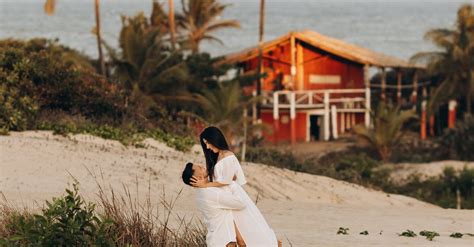 Couple Hugging on a Beach · Free Stock Photo