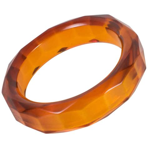 Carved Faceted Bakelite Bracelet Bangle Prystal Orangeade At 1stdibs