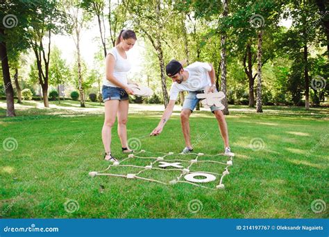 Boy And Girl Playing Tic Tac Toe In The Park Stock Image Image Of