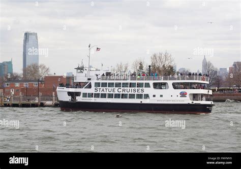 Statue Cruises Ferry Boat On Hudson River Taking Tourists To The Statue