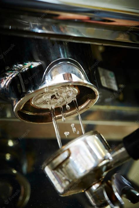 Premium Photo | Cleaning the espresso machine closeup of the espresso ...