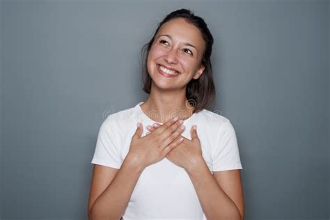 Grateful Girl Portrait Isolated On Gray Background Stock Photo Image