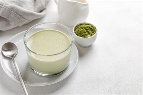 Premium Photo One Matcha Tea Panna Cotta Dessert In A Glass With