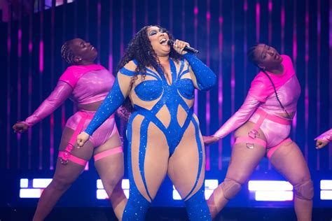 Lizzo Wears Neon Bedazzled Catsuit On Special Tour Popsugar Fashion