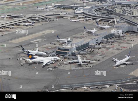 Aerial view of airplanes at airport terminal Stock Photo - Alamy