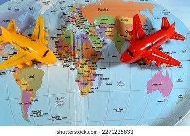 Colorful World Map Airplanes On Continents Stock Photo