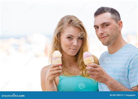 Man And Woman Eating Ice Cream On Beach Stock Image Image Of Sweet