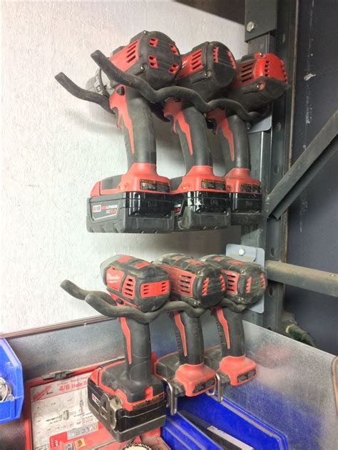 Shovel hooks as drill holders organized garage | Garage organization, Drill holder, Closet remodel