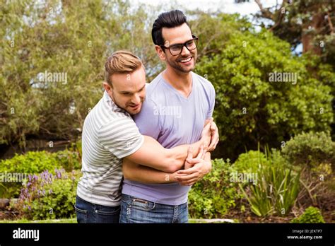 Happy Gay Couple Hugging Stock Photo Alamy