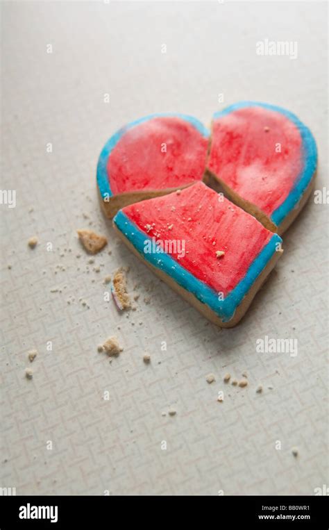 Broken Heart Shaped Valentine Cookie With Crumbs Stock Photo Alamy