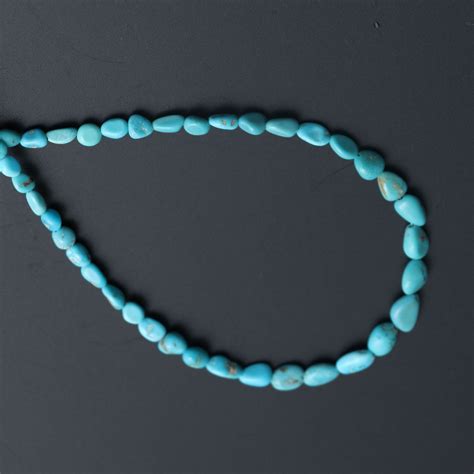 Turquoise Smooth Nuggets Beads Turquoise Nuggets X Mm To X Mm