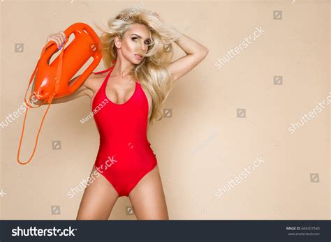 Sexy Busty Blonde Lifeguard Woman Red Stock Photo Shutterstock