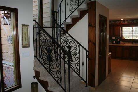 Interior Custom Ornamental Iron Stair Rail With Custom Design Panels Clásico Escalera