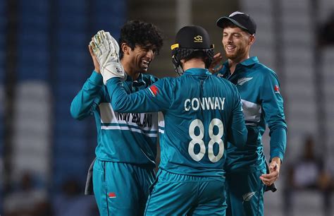 Rachin Ravindra Celebrates A Wicket With Mitchell Santner And Devon