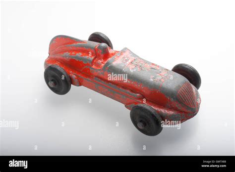 Antique Cast White Metal toy racing car, Orange Stock Photo - Alamy