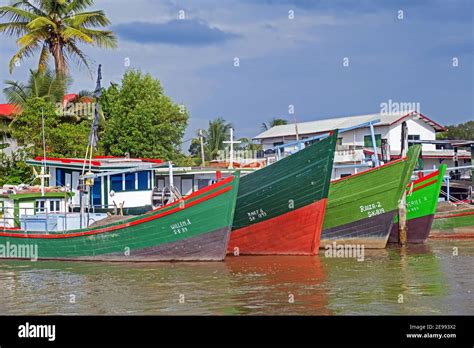 Traditional colourful wooden fishing boats in the harbour of New ...