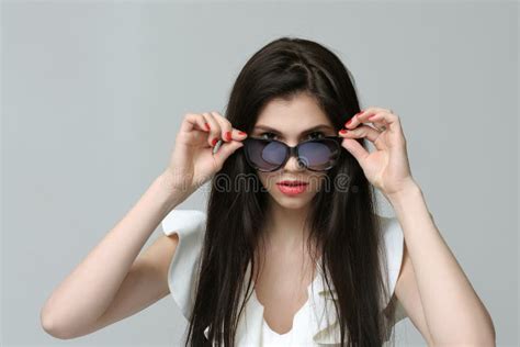 Portrait Of A Girl In A White Dress Who Removes Sunglasses Stock Image Image Of Attractive