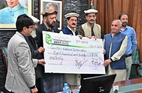 Chief Minister Gilgit Baltistan Haji Gulbar Khan Giving Away Cheque Of