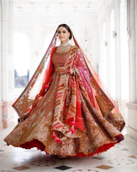 Beachside Wedding With The Bride In A Pastel Lehenga Bandhani Dupatta