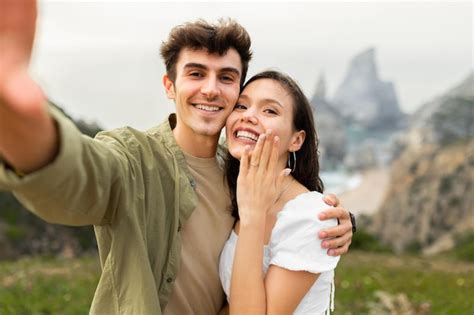 Premium Photo Unforgettable Proposal On The Beachfront Happy Couple