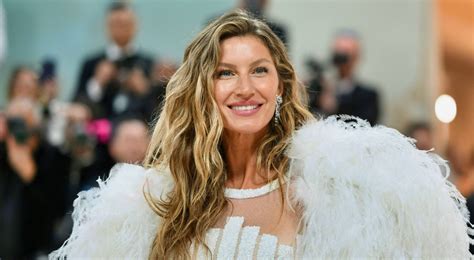 Gisele Bundchen Stuns While Showing Off In Black String Bikini