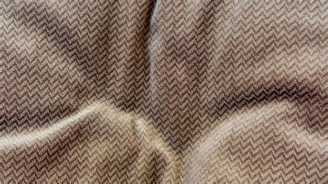 the brown fabric texture as a background 16206279 Stock Photo at Vecteezy