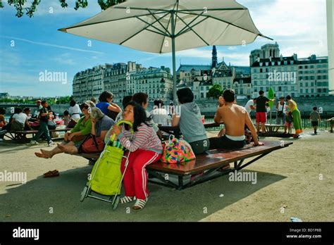 Paris France Public Events People Picnic On River Seine Plage At