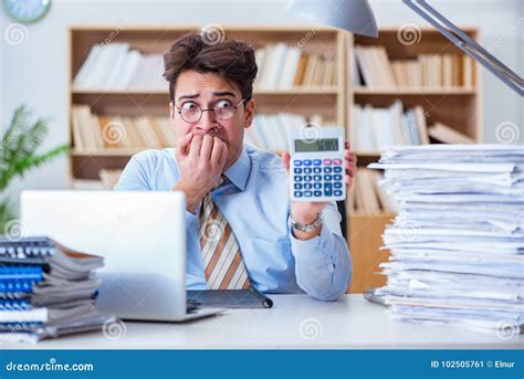 The Funny Accountant Bookkeeper Working In The Office Stock Image