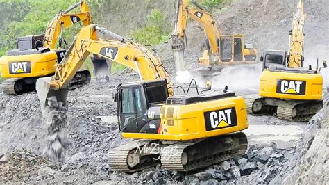 Cat 336d Lme 320d2 Excavator Breaking Dropping Loading Rocks Into Dump