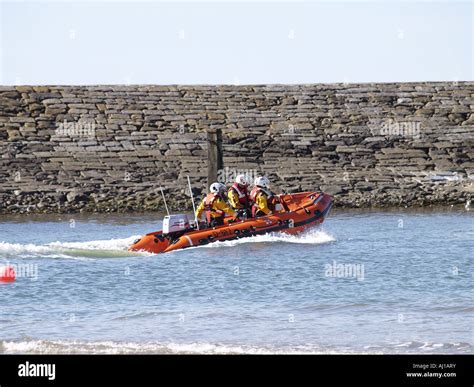 Royal National Lifeboat Institution Rnli Crew And Inshore Life Boat