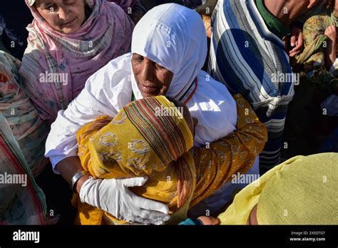 A Kashmiri Muslim Pilgrim Gives A Farewell Hug To Her Relative As She