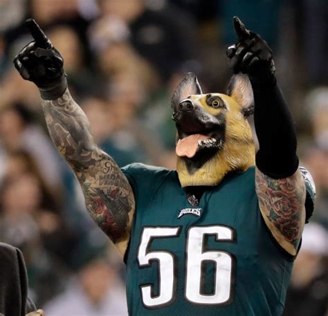 Why do Eagles players and fans wear dog masks? | Metro News