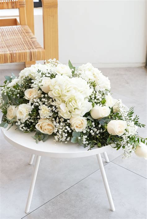 Perfect White Funeral Spray– Flowers.ie