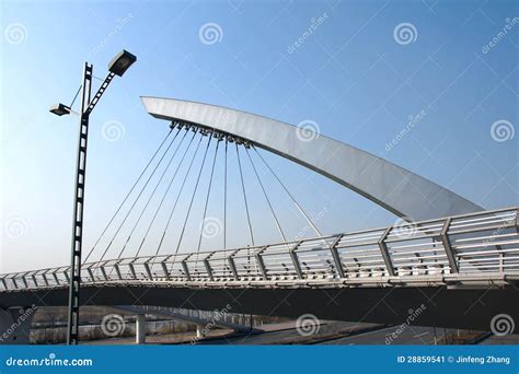 Cable suspension bridge stock image. Image of buildings - 28859541