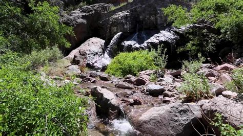 A waterfall takes over Dripping Springs Trail in the Organ Mountains