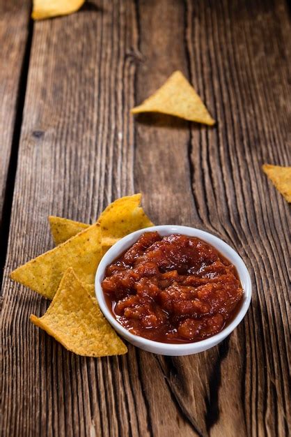 Premium Photo | Nachos with salsa dip