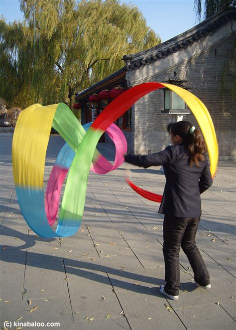 Photographs of ribbon dancing in Beihai Park, Beijing