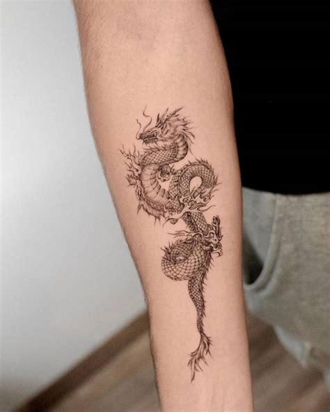 Single Needle Dragon Tattoo On The Inner Forearm