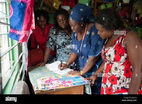 A Female Tailor In Nigeria Africa Designs Clothing For Her Customers