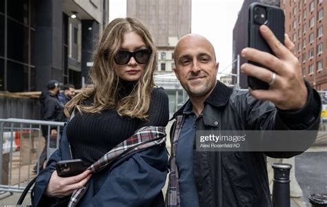 a man and woman taking a selfie in the city