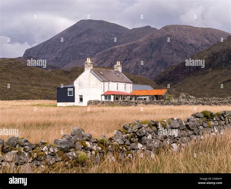 Remote White Painted House In Camasunary Bay With Red Cuillin Mountains