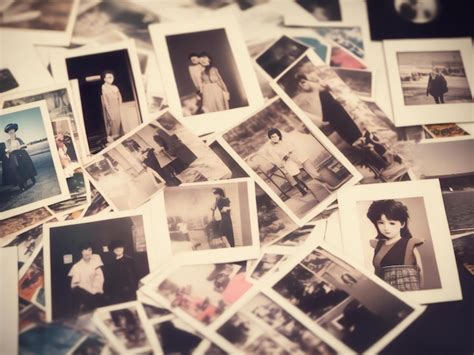 Premium Ai Image Stack Of Old Polaroids A Nostalgic Collection Ai