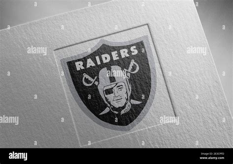 raiders logo paper texture illustration Stock Photo - Alamy